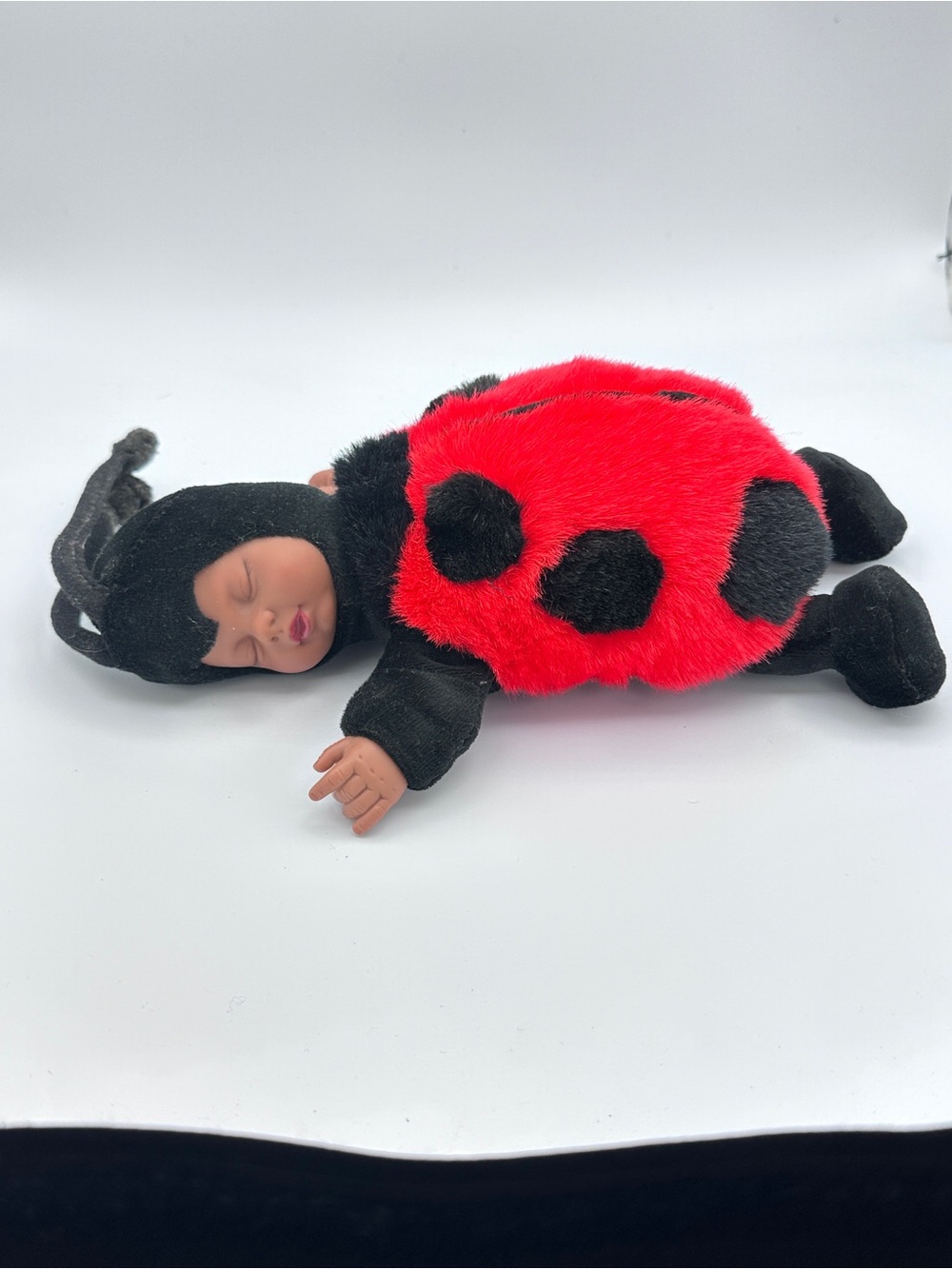 Anne Gesses Weighted Plush Ladybug Baby Doll - Red and Black